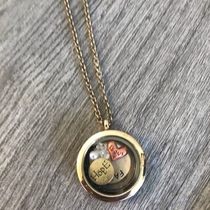 Chicos long gold necklace with charm pendant